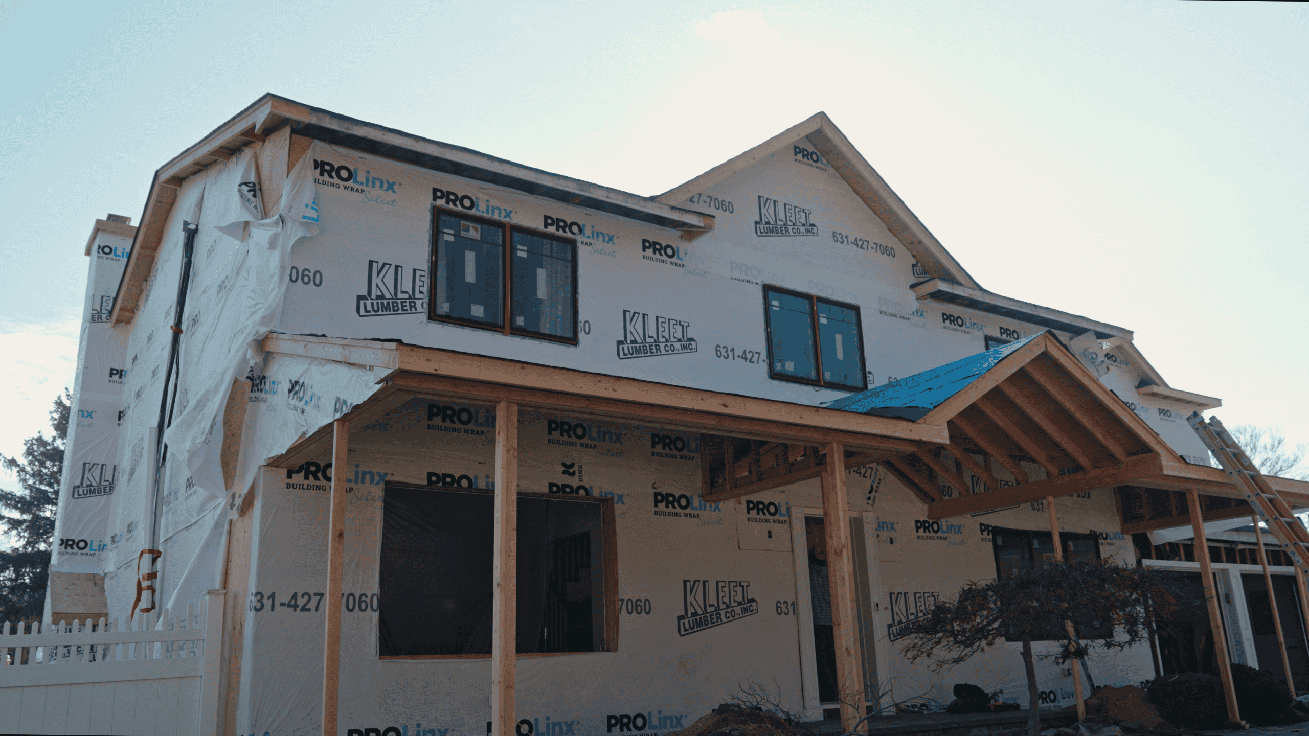 Dormer build showing new rafters and sheathing on Long Island